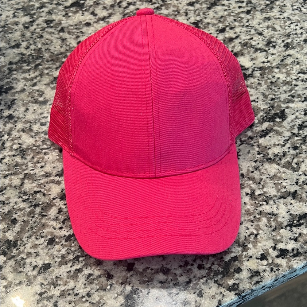 Pink hat with ponytail slot
